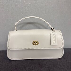 Coach White Leather crossbody/handbag this reimagined edition of the 1990 bag